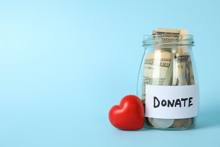 glass-jar-with-text-donate-heart-blue-space_185193-5165